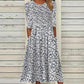 Nyzara™ - Robe midi bleu marine à imprimé marguerite